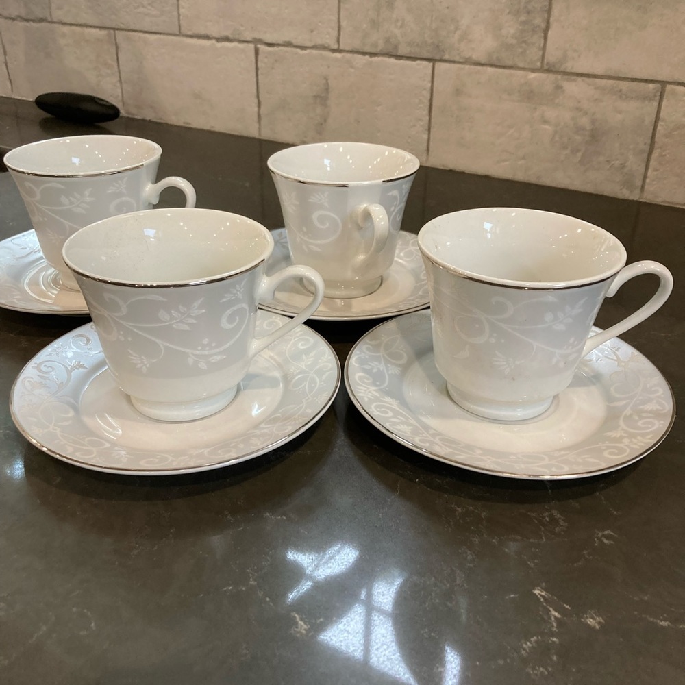 Coffee cups, saucers and creamer. Chris Madden for home collection.